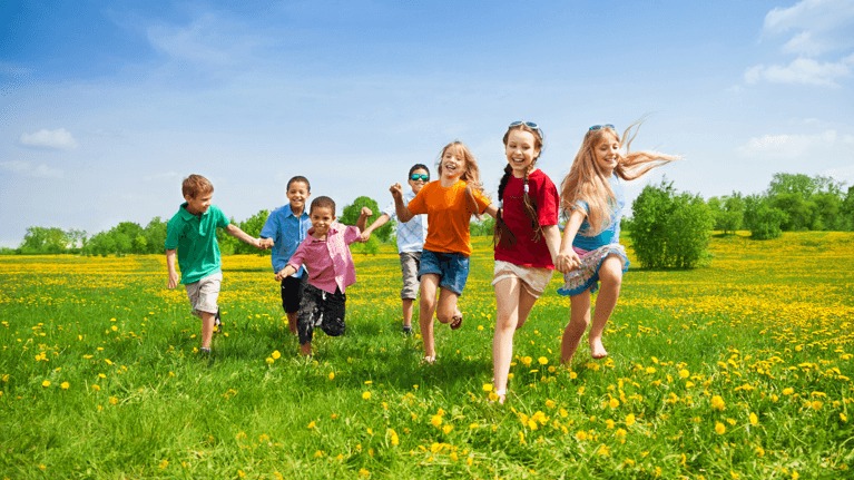 Children racing outdoors