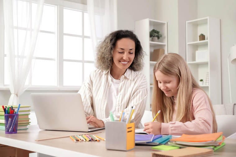 Mom and daughter doing math homework