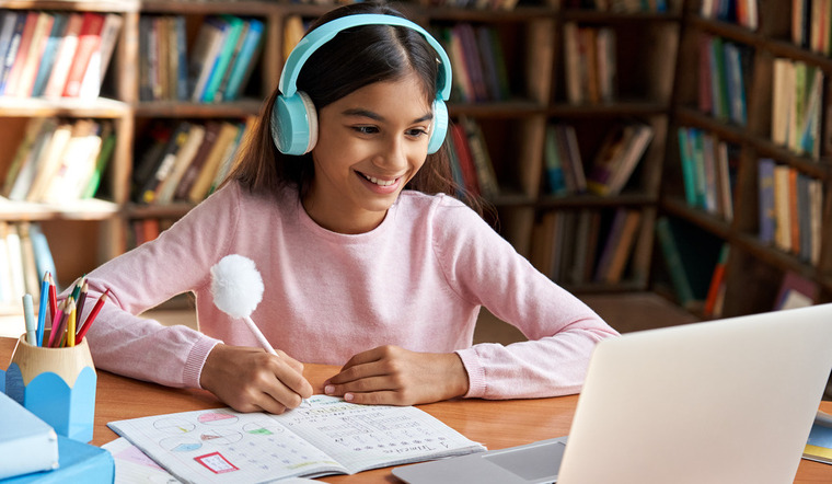 a middle school student attending a live math tutoring session online