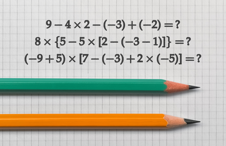 Example of the basic math operations with brackets and a pencil on bright background