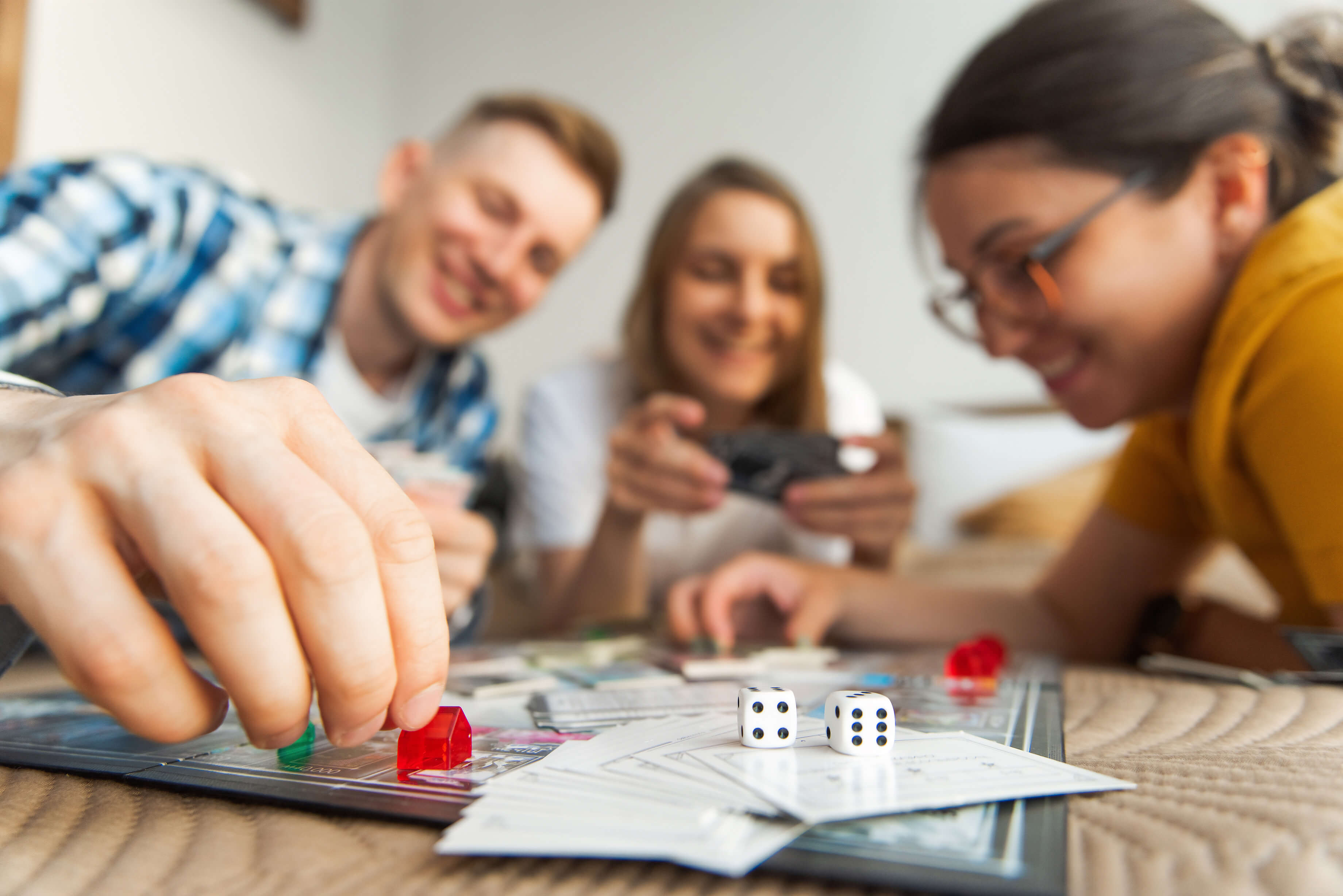 People playing a board game