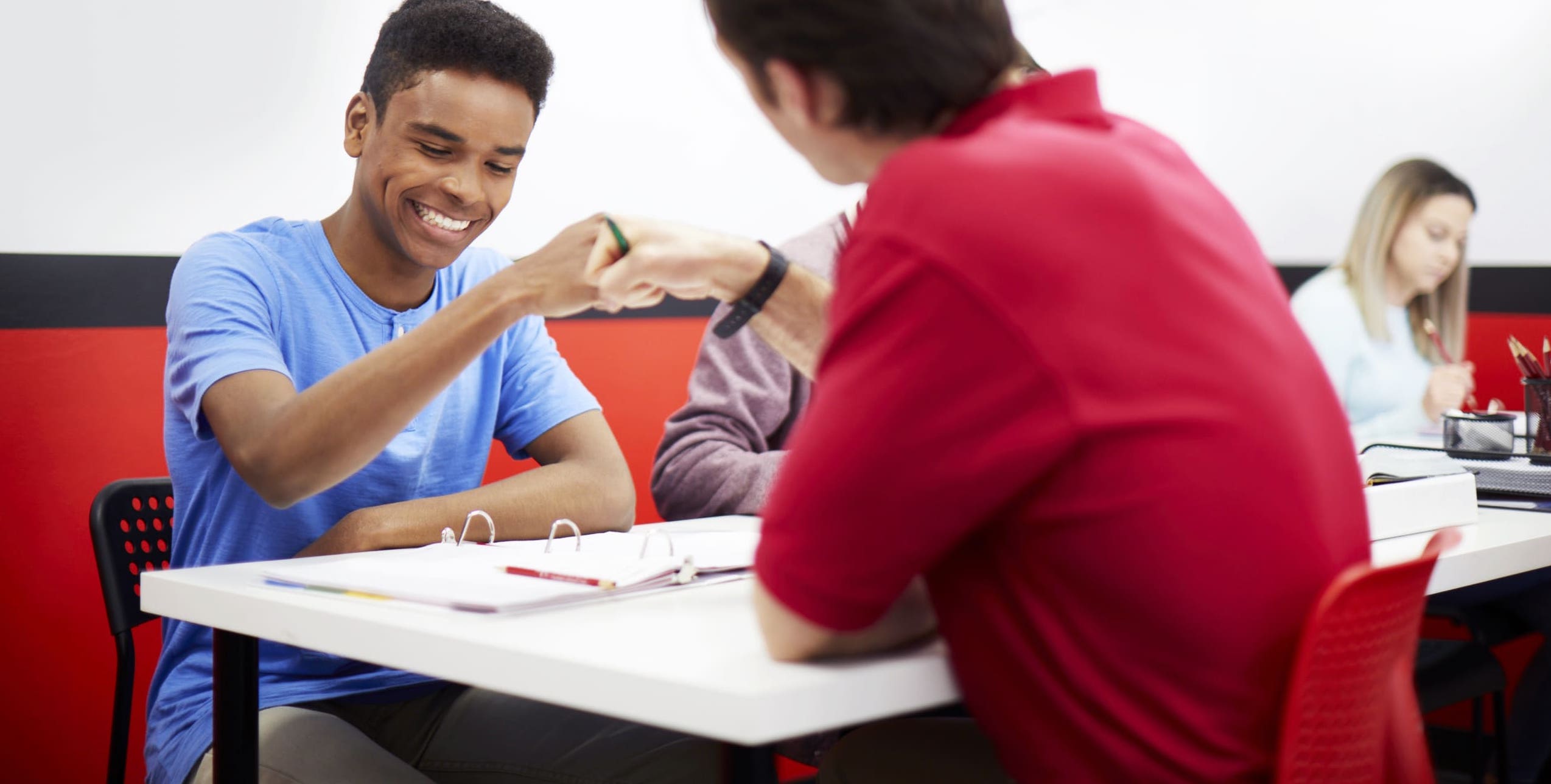 High school student learning advanced calculus with tutor support