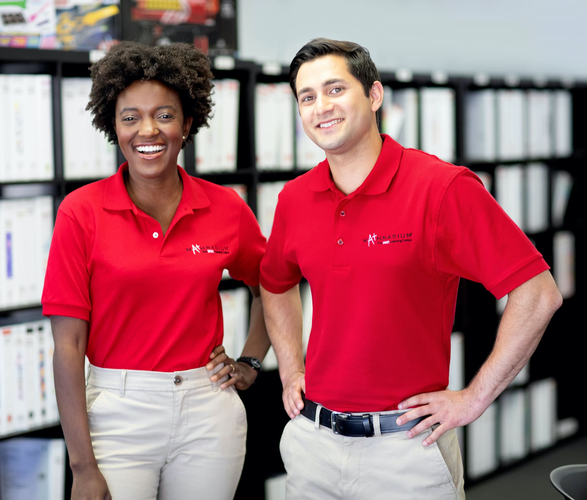Two Mathnasium tutors smiling.