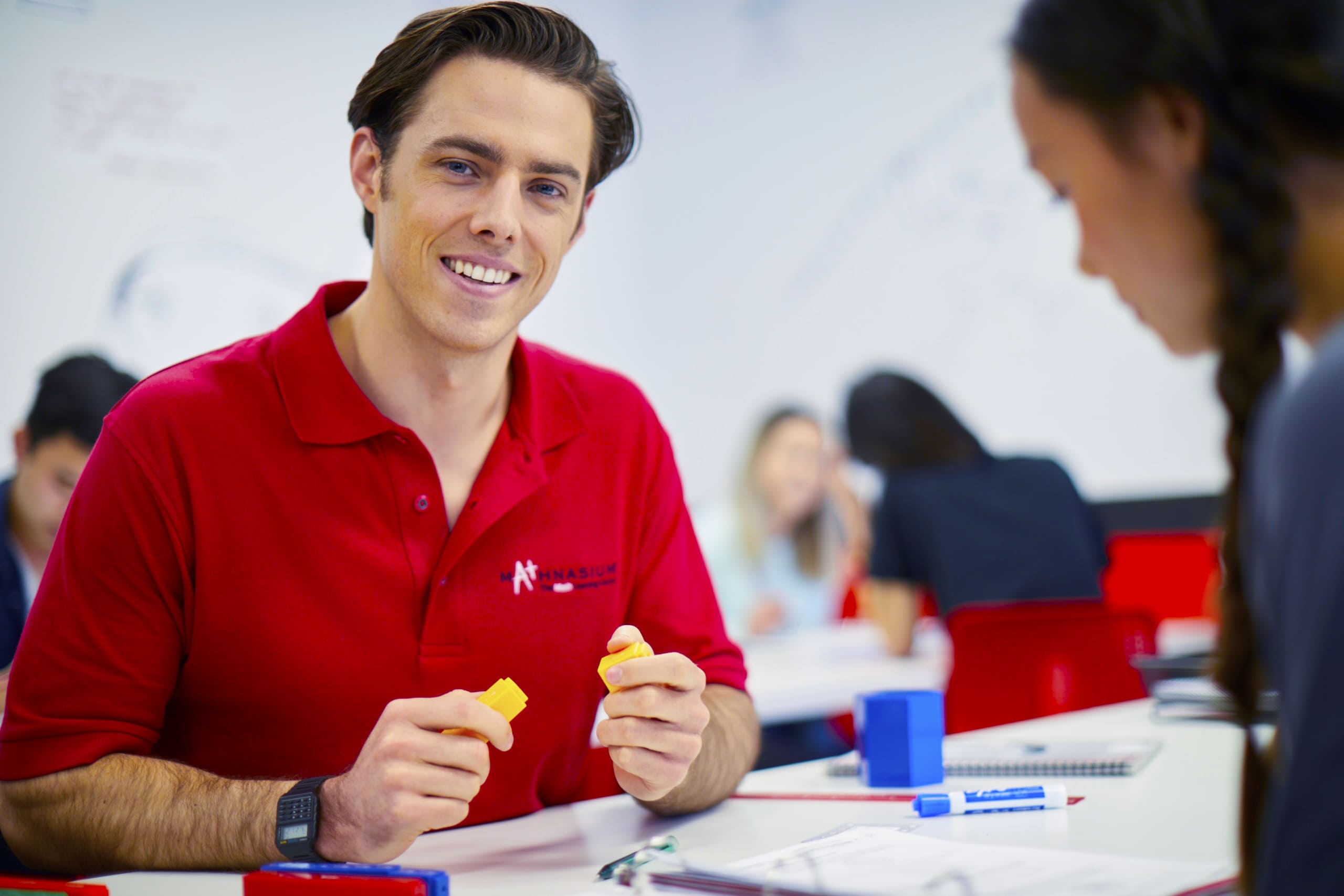 High school student learning math with tutor support