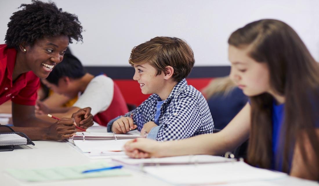 Mathnasium tutor helping a student.
