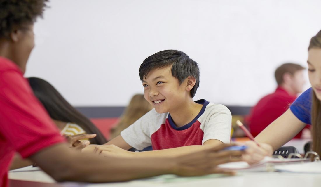 Mathnasium tutor and student learning in a classroom.