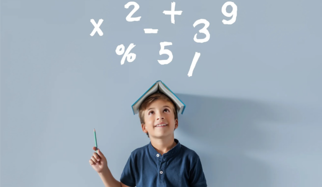 A boy holds a pencil, gazing up at a number sign, indicating curiosity or contemplation about numbers.