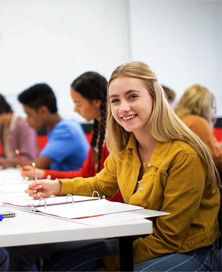 teenage girl smiling during her statistics tutoring class