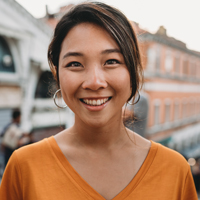 middle-aged Asian woman smiling
