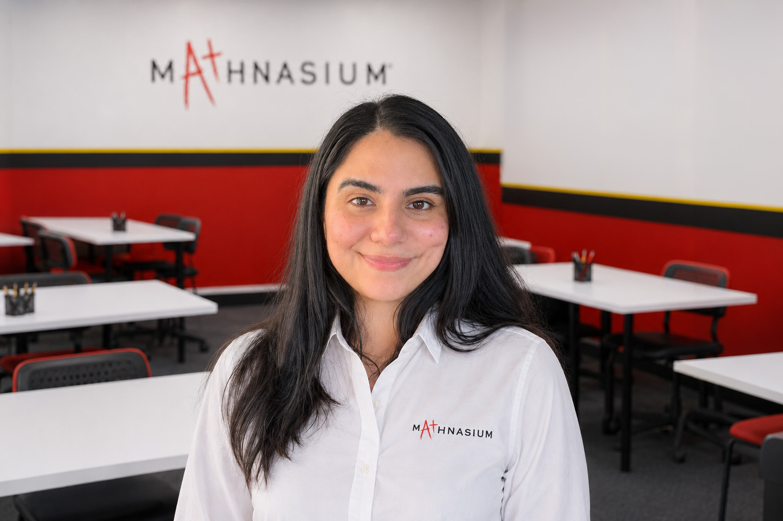 Image displaying woman smiling as the new owner of Mathnasium Coventry